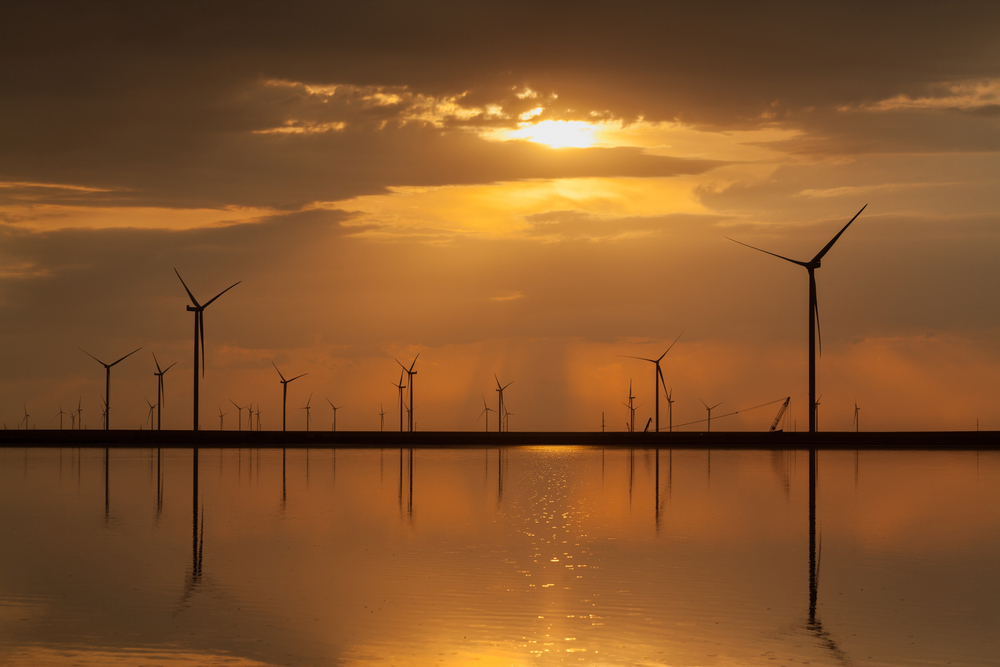 Group of turbines on coastline uk